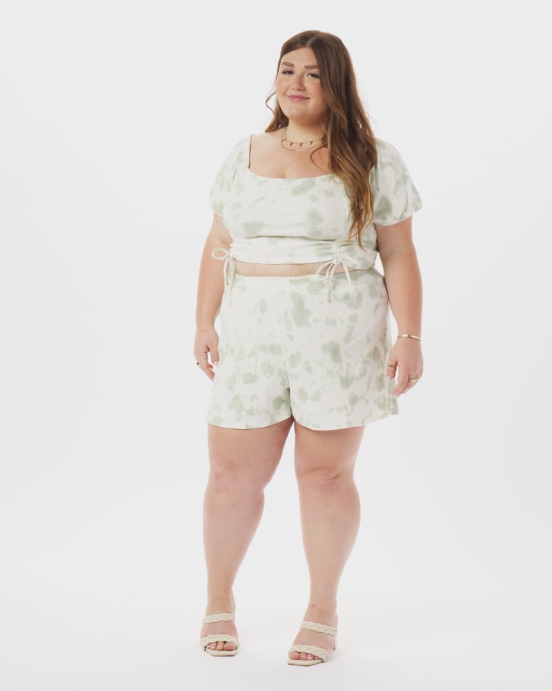 Front of a model wearing a size 1X Bo Bottom in Sky Blue in White by What Lo Wants. | dia_product_style_image_id:273976